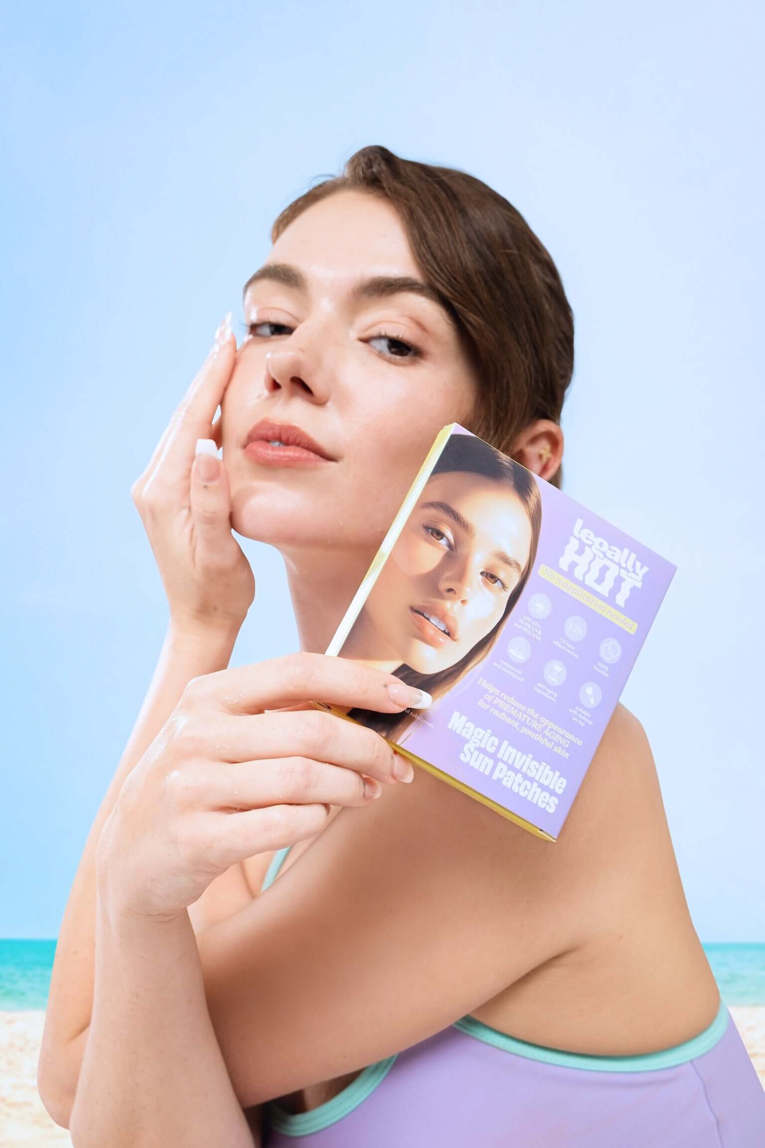 Model showcasing 12-Hour Invisible UPF 50+ Sun Patches against a beach backdrop.